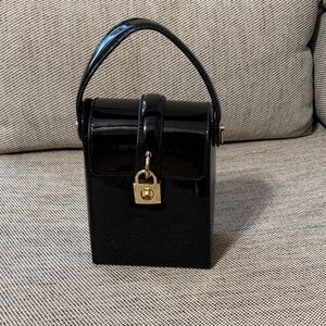 Elegant Black Handbag with Gold Accents